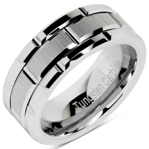 Silver contemporary and industrial style wedding band with a brushed center, polished edges, and carved pattern design.