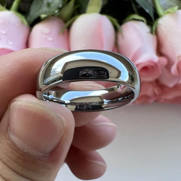 The Bryant, a shiny 8mm silver tungsten wedding ring with domed design and polished finish.