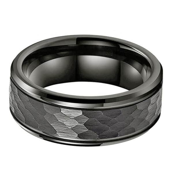 An 8mm minimalist tungsten men's wedding ring featuring a gunmetal hammered finish, polished beveled edges, and a smooth sleeve.