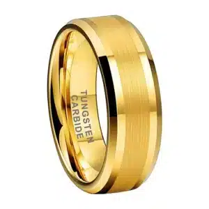 The Blake, a 18K gold-plated men's tungsten wedding ring with brushed finish and polished beveled edges, stands on its curve.