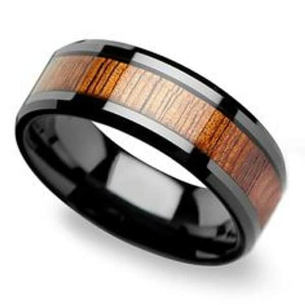 A closer view of an 8mm wood tungsten wedding ring with polished black edges and sleeves.