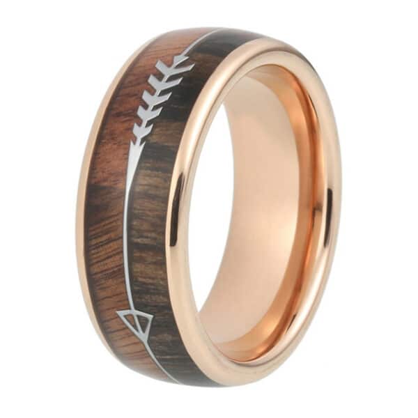 A 8mm tungsten wedding band featuring KOA and zebra wood inlay, polished finish, arrow design, and gold plated edges and sleeve.