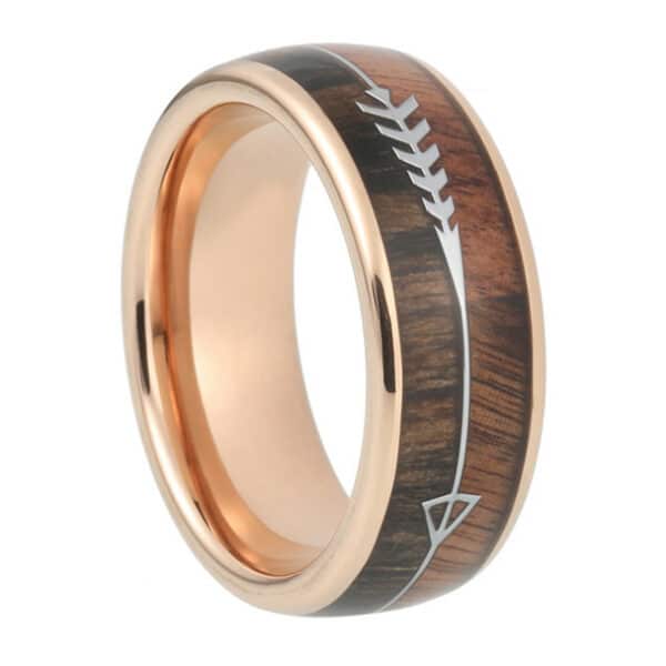 A wood inlay wedding band that features KOA and zebra wood inlay with an arrow design, gold-plated sleeve, and polished finish.