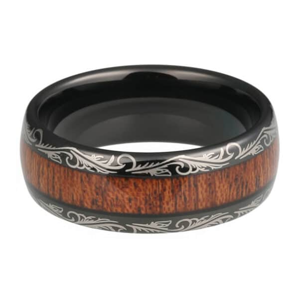 A black men's wedding band that features a laser etched design, KOA wood center, 8mm width, and polished finish.