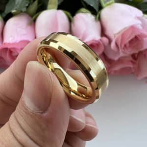 An 18k gold-plated, 6mm, classic yet contemporary wedding band with a brushed center and polished beveled edges and sleeves.