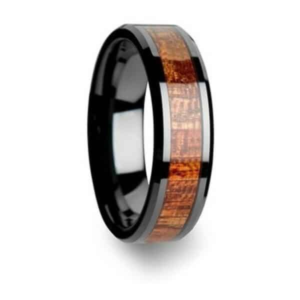 An 8mm black tungsten carbide ring with koa wood and polished finishing.